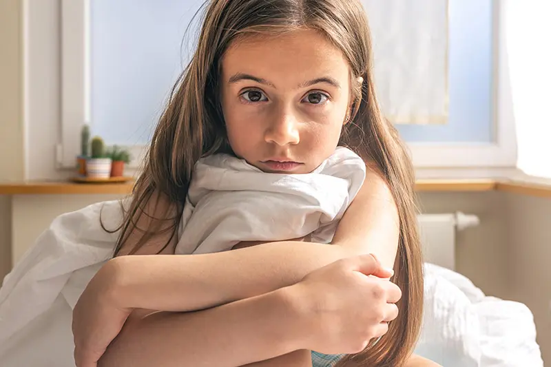 Parent rewarding child with positive reinforcement